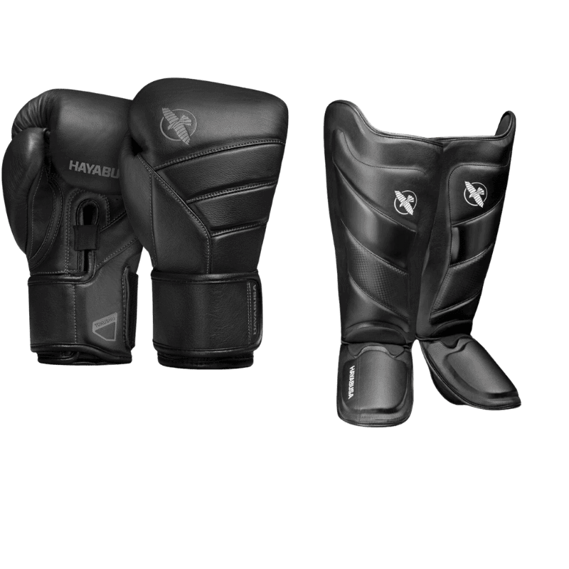 Complete zwarte Fairtex boks set met handschoenen en scheenbeschermers voor maximale bescherming en comfort tijdens training