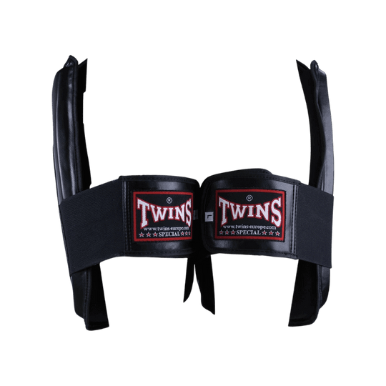Close-up van de klittenbandsluiting van de Twins Special beenbeschermers, toont hoe de beschermer stevig kan worden vastgemaakt voor een veilige en comfortabele pasvorm.