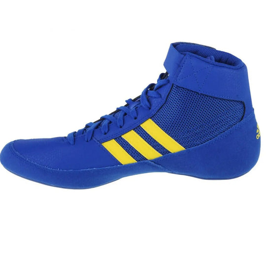 Adidas worstelschoen Havoc in blauw met gele strepen en hoge vetersluiting.