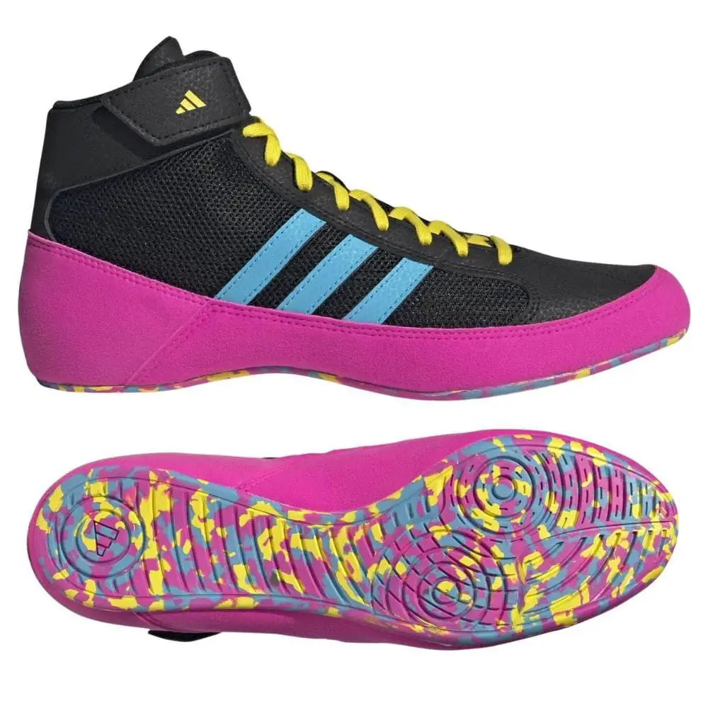 Adidas Kids Havoc worstelschoenen in zwart, roze en cyaan met gele veters en kleurrijke gripzool. De hoge enkelsteun en lichte pasvorm maken de schoenen geschikt voor jonge worstelaars, grappling en intensieve trainingen op de mat.