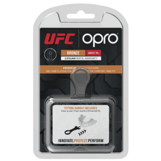 Verpakking van een Opro UFC bronzen mondbeschermer, geschikt voor volwassenen, met een tandheelkundige garantie en compressiehulpmiddel.