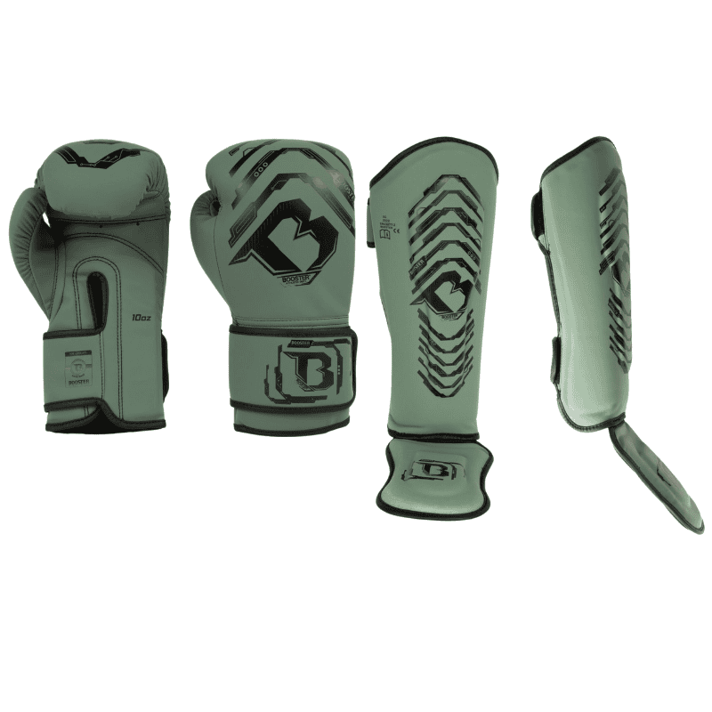 Complete groene Booster boks set met bijpassende handschoenen en scheenbeschermers voor veilige en comfortabele training








