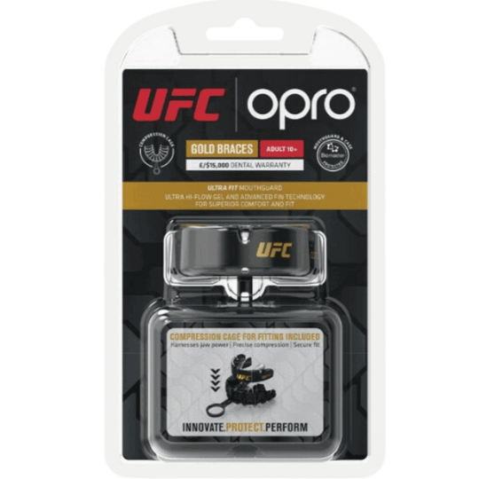 Verpakking van een Opro UFC gouden mondbeschermer voor beugeldragers, met technologische eigenschappen en inclusief een compressiehulpmiddel voor het aanpassen.