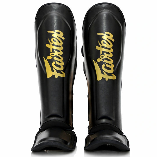 Fairtex scheenbeschermers zwart goud voor kickboksen en Muay Thai met maximale bescherming