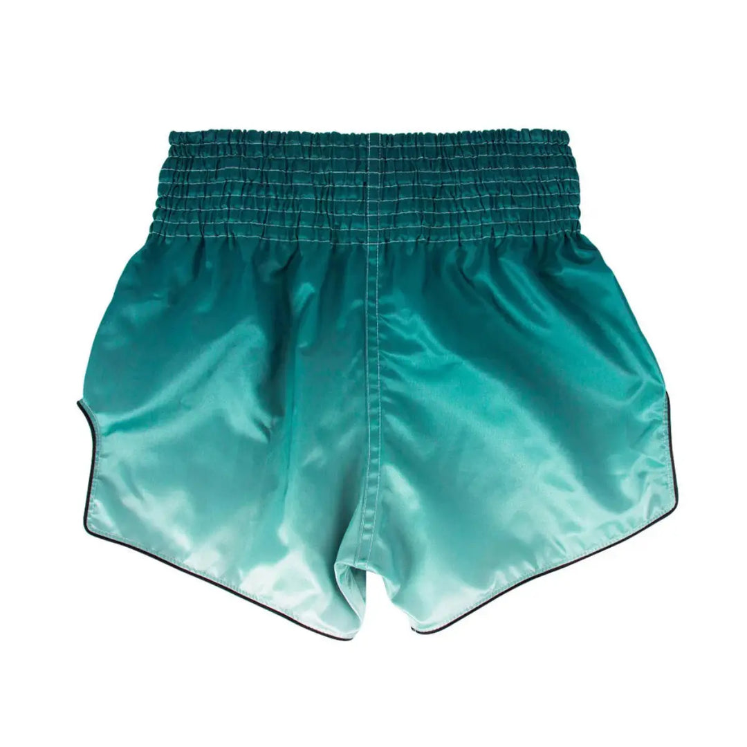 Turquoise Fairtex kickboks broekje van achteren, met elastische tailleband en gladde satijnen stof.