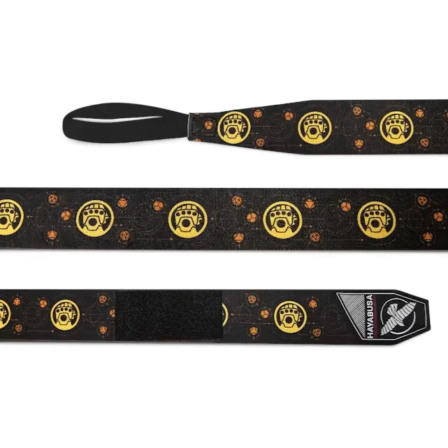 Uitgerolde Hayabusa Thanos bandage met zwart design, gele Infinity Gauntlet symbolen en Infinity Stones print, met Hayabusa-logo op de sluiting.