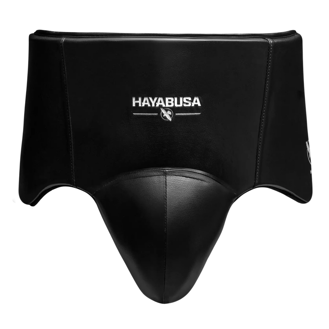 Front view of a black Hayabusa groin protector with a contoured protective cup and smooth outer finish. The centered Hayabusa logo and ergonomic shape highlight secure coverage, comfort, and reliable protection for boxing and intensive training sessions.