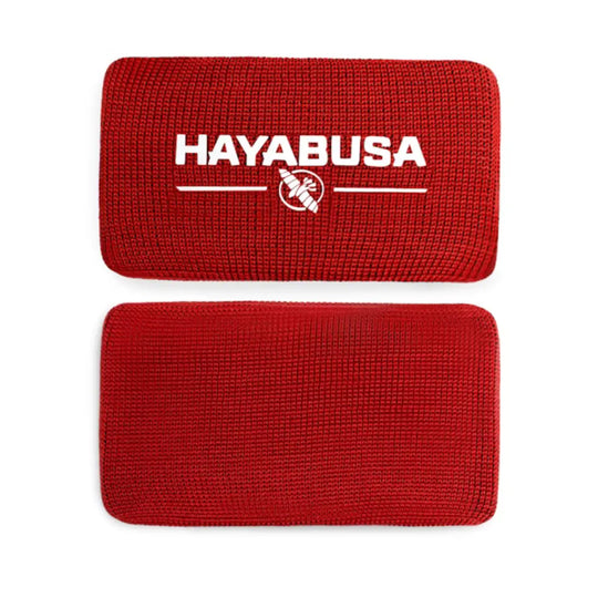 Hayabusa Knokkelbeschermers in rood, gedetailleerde close-up van het beschermende schuim en de stof