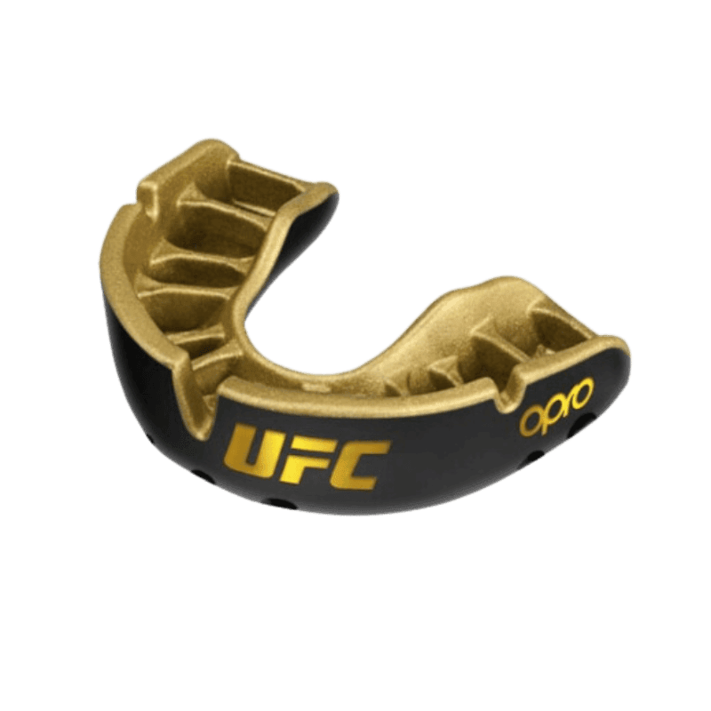 Gouden Opro UFC mondbeschermer voor jongeren, met zwarte details en het UFC-logo, los tegen een zwarte achtergrond.
