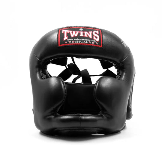 Zwarte Twins hoofdbeschermer met volledige gezichtsbescherming, vooraanzicht met rood Twins-logo zichtbaar op het voorhoofd.