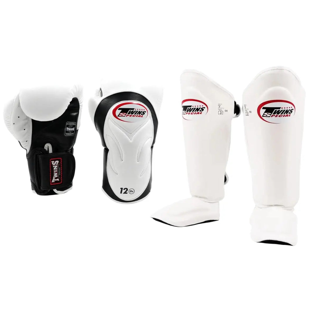 Twins Special set in zwart en wit bestaande uit bokshandschoenen van 12 oz met brede klittenbandsluiting en bijpassende SGL7 scheenbeschermers met geïntegreerde voetbescherming. Ontworpen voor optimale bescherming tijdens boksen en kickbokstraining in de gym.