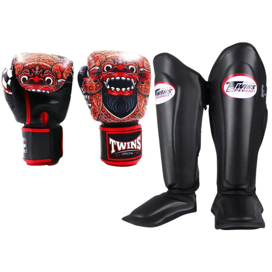 Twins Special bokshandschoenen met rood demon design gecombineerd met zwarte Twins scheenbeschermers met wit en rood Twins-logo.