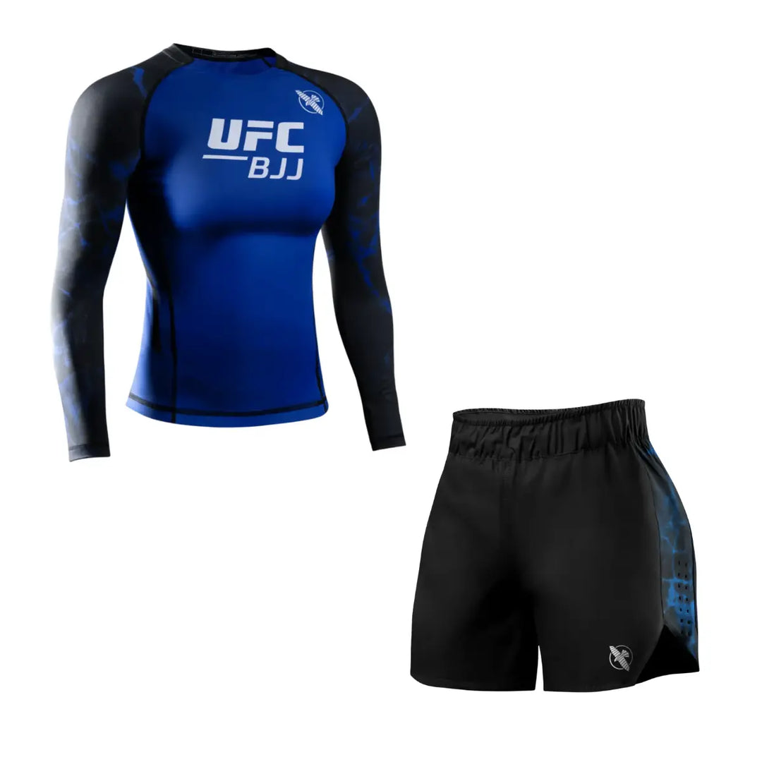 Productfoto van een UFC BJJ dames set met een blauwe long sleeve rashguard en een zwarte trainingsshort met blauwe accenten, afgebeeld tegen een witte achtergrond.