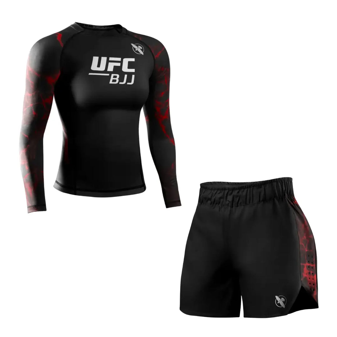 Productfoto van een UFC BJJ dames set met een zwarte long sleeve rashguard en een zwarte trainingsshort, beide met rode accenten, afgebeeld tegen een witte achtergrond.
