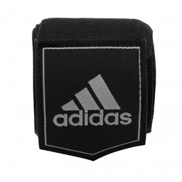 Korte zwarte adidas handwraps met witte branding, klaar voor gebruik.