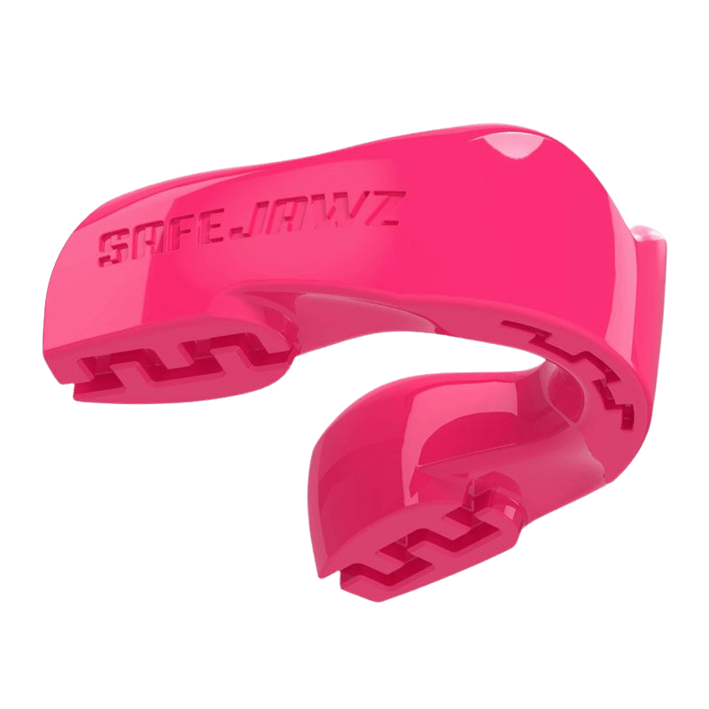 Neon roze SafeJawz mondbeschermer geïsoleerd op een witte achtergrond, met het merklogo aan de zijkant.