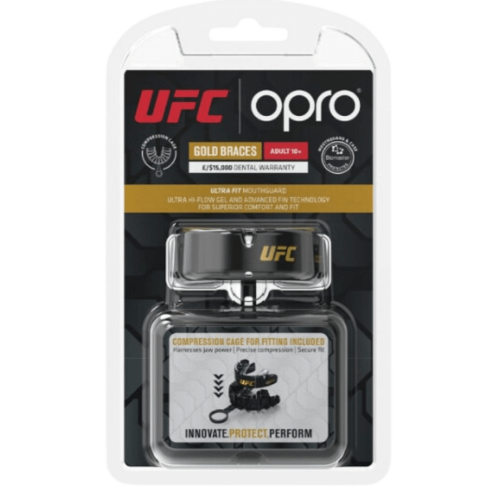 Verpakking van een Opro UFC gouden mondbeschermer voor beugeldragers, met technologische eigenschappen en inclusief een compressiehulpmiddel voor het aanpassen.