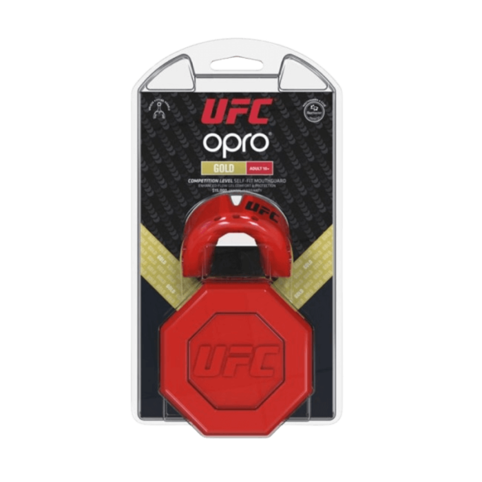 Opro UFC gouden mondbeschermer verpakking met rood-zwart ontwerp, speciaal voor competitieniveau.